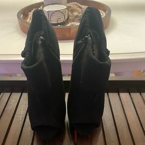 Black Peep toe boot heels.